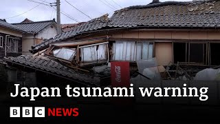 Japan downgrades major tsunami warning after earthquakes  BBC News [upl. by Anahsed]